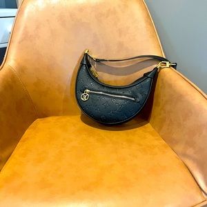 Western style LV purse not rea l